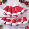 image:imageBeaupretty 20 Pieces Christmas Hair Clips Santa Hat Hair Clips Cute Mini Red Santa Hat Hair Grips Barrettes for Girls10 Count Pack of 1